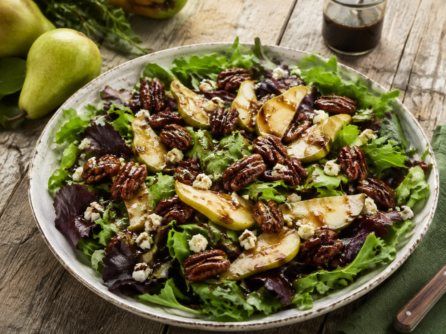 Candied pecans in a garden salad